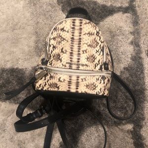 Michael Kors mini snake skin backpack!